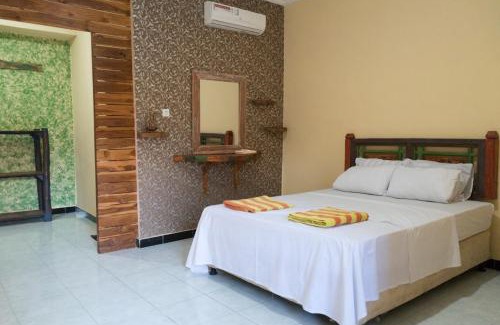 Tukad Mungga Bed & Breakfast | Sunrise Lodge & Lounge