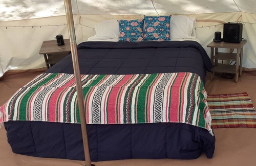 Spring Branch RV Rental | Sunset Ridge Glamp Tent Queen Bed, 2 cots, AC and Electric