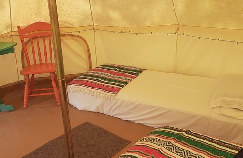 Spring Branch RV Rental | Sunset Ridge Glamp Tent Queen Bed, 2 cots, AC and Electric
