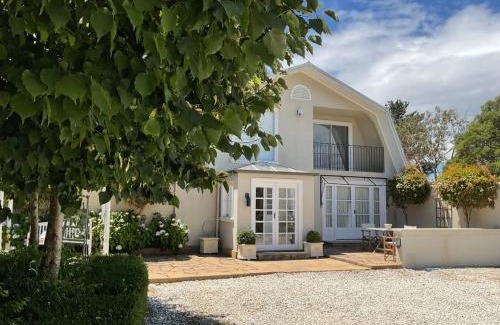 Clarence Point House | Sunset Sanctuary: Waterfront Home with Balcony and Patio