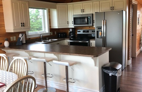Chelton House | Sunset Views Vacation Home - Hottub