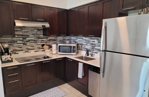 Celebration Apartment | Sunshine Suite 2BR/Pet-Handicap Friendly/Pool View/10 Min Disney