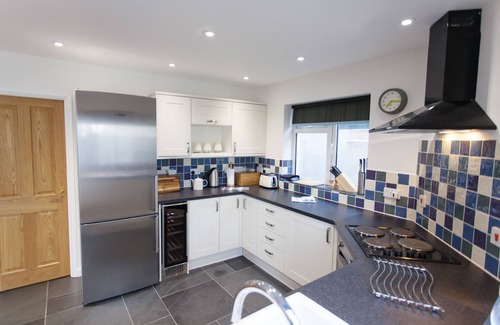Coverack House | Superb sea views. Private off-road parking. Fenced garden. Spacious,light,airy.