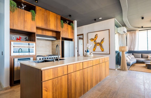 Tulsayab Condo | Surreal coastal apartment with local design, shared pool, hot tub, & dogs ok