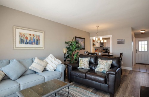 Caswell Beach Condo | Swept Away: Modern Oceanfront Condo Steps from Community Pool