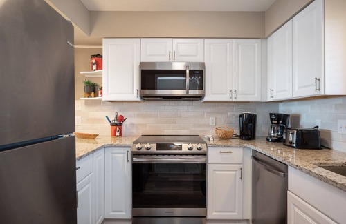 Caswell Beach Condo | Swept Away: Modern Oceanfront Condo Steps from Community Pool