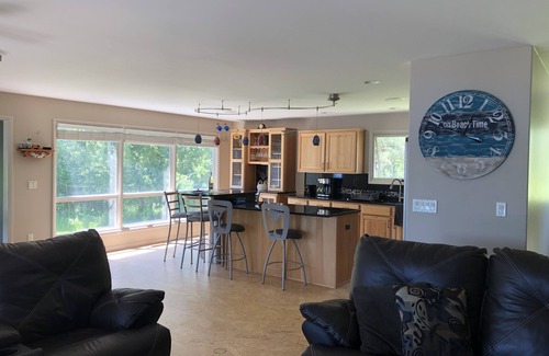 Traverse City House | Swim, Bike, Enjoy-3-bed, 4 bath lake front home in Traverse City
