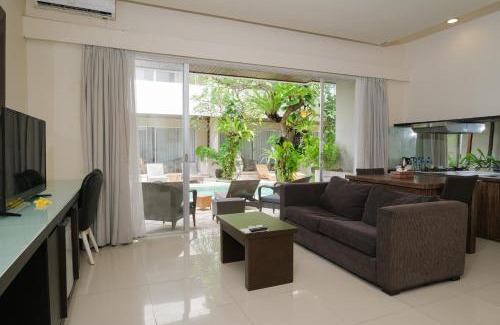 Sunset Road Apartment | Swiss-Belcourt Sunset