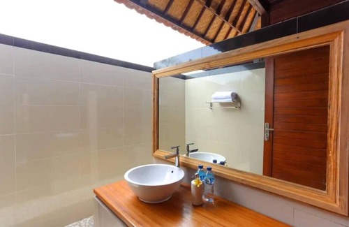 Mushroom Bay Hotel | Taman Sari Villa, Nusa Lembongan #1 Twin Bedroom with Garden view