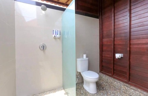 Mushroom Bay Hotel | Taman Sari Villa, Nusa Lembongan #1 Twin Bedroom with Garden view