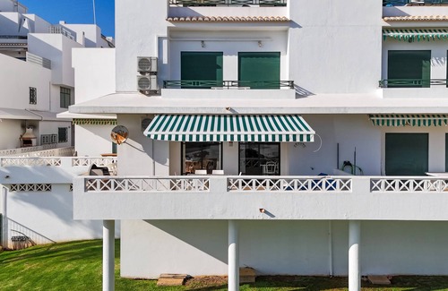 Olhos D'Agua Apartment | Tangerine Apartment by HelloVacations