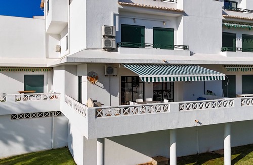 Olhos D'Agua Apartment | Tangerine Apartment by HelloVacations