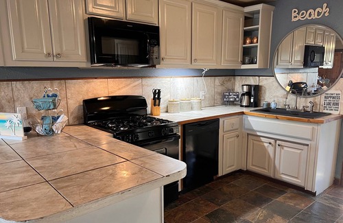 Vian House | Tenkiller Lake Beach Themed Retreat Offering a Perfect Oasis for Our Guest.