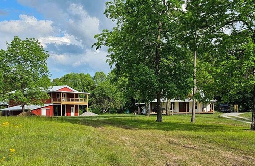 Deer Lodge RV Rental | Tentrr Signature Site - Reflection Tree Art Farm Forest Pond site