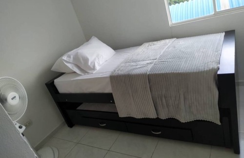 Soledad Apartment | The apartment has a balcony overlooking the city.