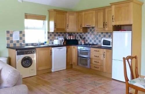 Ballycarnahan Cottage | THE BAY, pet friendly, with open fire in Caherdaniel, County Kerry