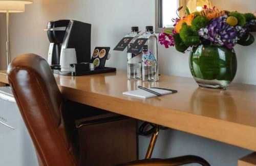 Northeast Dallas Apartment | The Beeman Hotel includes an indoor swimming pool. Dallas Love Field airport .