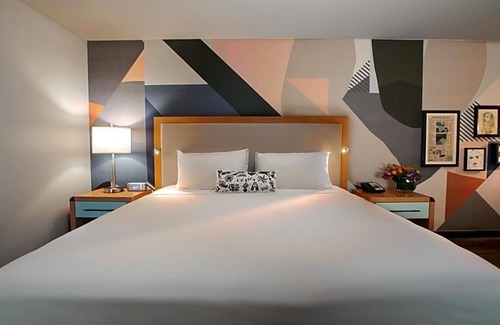 Northeast Dallas Apartment | The Beeman Hotel includes an indoor swimming pool. Dallas Love Field airport .