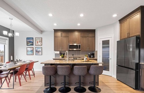 Southeast Edmonton House | The Canadiana | Games Room | Sleeps 11 | King Bed