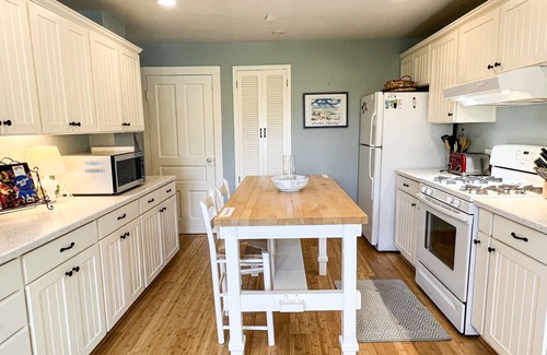 Wequetonsing Cottage | The Castle Cottage - 63 Beach - Weque - Private Lake Access