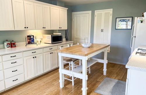 Wequetonsing Cottage | The Castle Cottage - 63 Beach - Weque - Private Lake Access