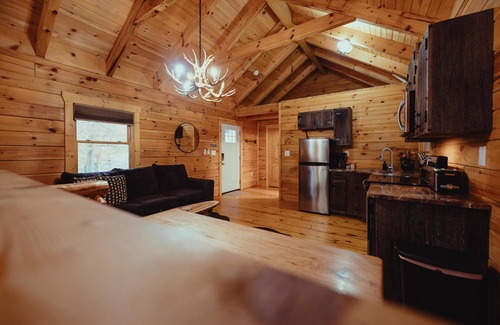 South Bloomingville Cabin | The Escape - Stay at the Escape Cabin in Hocking Hills, OH! Enjoy a cozy stay with a hot tub, fire pit, hiking, waterfalls, and more. Book your getaway today!