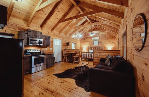 South Bloomingville Cabin | The Escape - Stay at the Escape Cabin in Hocking Hills, OH! Enjoy a cozy stay with a hot tub, fire pit, hiking, waterfalls, and more. Book your getaway today!