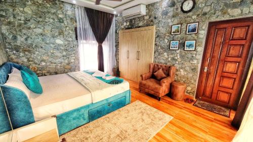 Kumai House | The GreyStone FarmHouse, Turibari