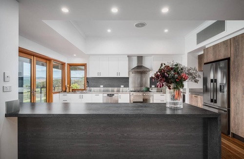 Porepunkah House | The Grove Estate - The pièce de resistance of this property is the view, be it the 360-degree views of the surrounding bush side, valley and the Region’s famous Mt Buffalo or perhaps the view of the spectacular and famous artwork showcased through th