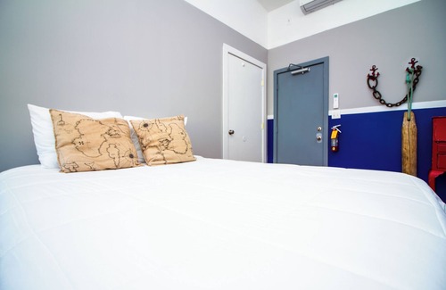 Queens Condo | The High Tide Two Bedroom Suite #8 Hotel Room by RedAwning