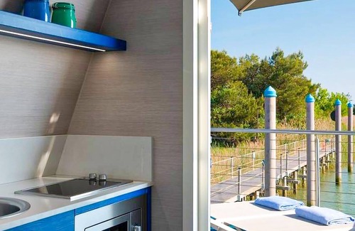 Lignano Sabbiadoro Boat Rental | The ideal place to unwind ? comfortable and modern houseboat on the river Tagliamento.