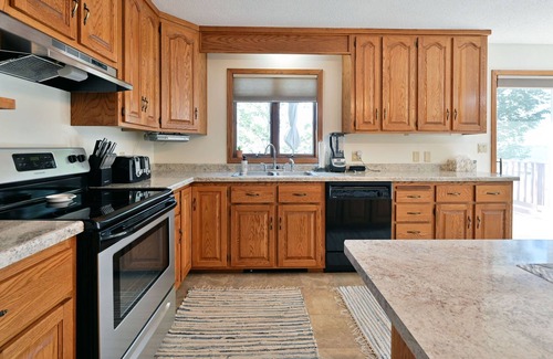 Shell Lake House | The Lively Loon- Exceptional sandy beach located minutes from Shell Lake.