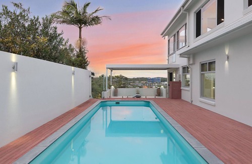 Coffs Harbour Apartment | The Lookout Lounge | 5BR Coastal Home with Pool and Stunning Views