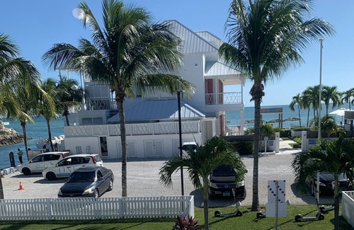 Palm Cay Apartment | The Marina Room is a guest room with an outstanding Marina view .