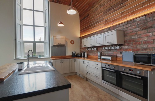 Norham Cottage | THE OLD CHAPEL, pet friendly, with open fire in Norham