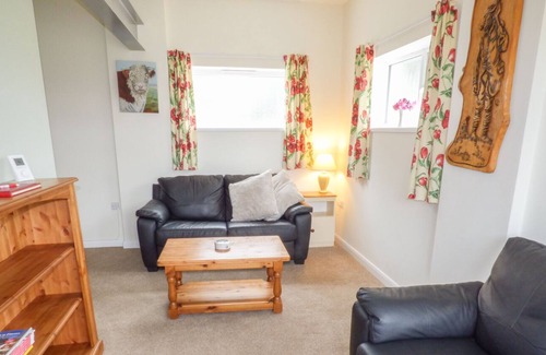 Christchurch Cottage | THE OLD DAIRY HOLIDAY COTTAGE, romantic, with a garden in Oakford