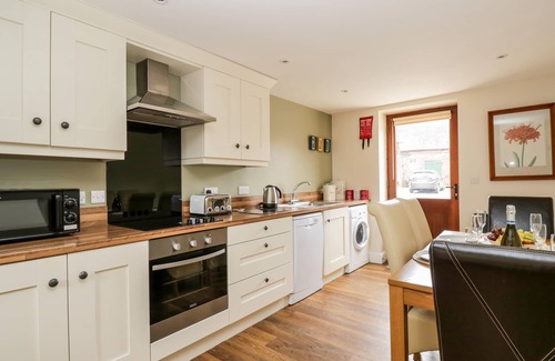 Wigton Cottage | THE OLD GRAINSTORE, family friendly in Bolton Low Houses
