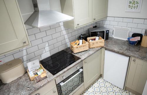 Lixwm House | The Old Mill Holiday Cottages, Nr Mold