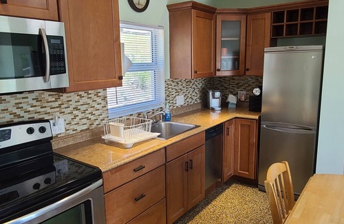 Jensen Beach Cottage | The Palms is secluded & view of the intercoastal.