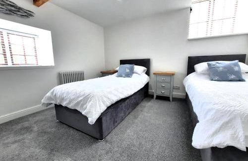 Camborne Apartment | The Penthouse, top floor of a Grade II Listed Mill