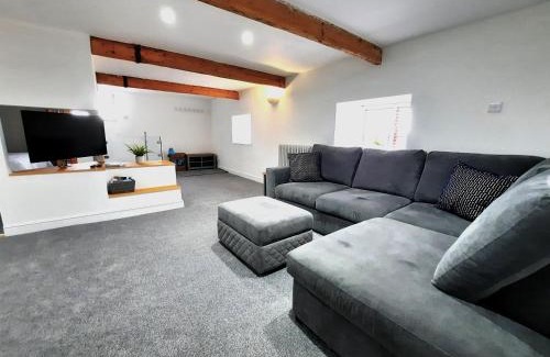 Camborne Apartment | The Penthouse, top floor of a Grade II Listed Mill