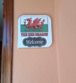 Dassia House | The Red Dragon