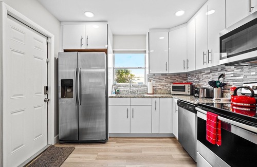Lantana House | The Surf Shack! Pool Home With Private Backyard Oasis. Close to Beach & Dining