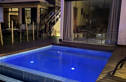 Praia Grande Ski Chalet | Theme Chalets with heated pool at the foot of the Malacara Canyon.