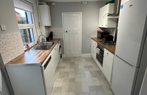 Gloucester House | This three bedroom house features zip and link beds, one bathroom and a fully equipped kitchen.