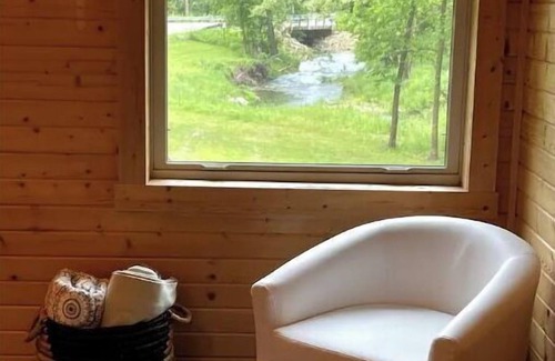 Westby House | Timber Coulee Creek in backyard, king size bed, grill on deck, large garage.