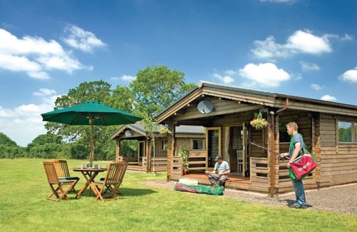 Cullompton Ski Chalet | Timber lodge with one double and one twin.