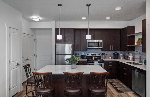 Sunset Heights Apartment | Timp View Luxury Haven with year round hot tub, climbing wall, & bowling