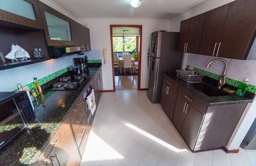 Guayabal Apartment | Top floor apt w/Balcony in El Poblado, 1 minute walk to SantaFe Mall!