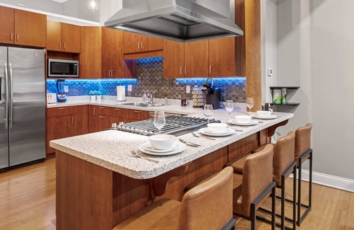 Wholesale District Apartment | Top Floor Loft by Convention Center Smart Home